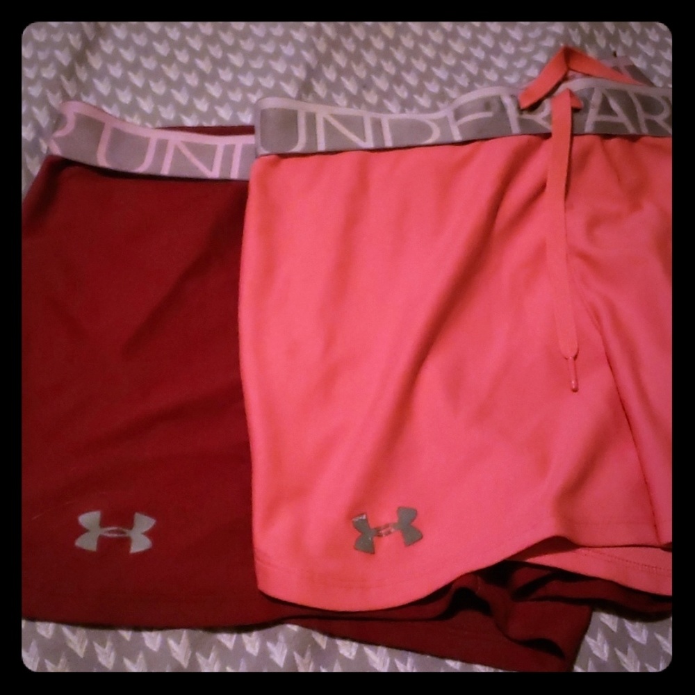 2 pairs of colorful under armour shorts